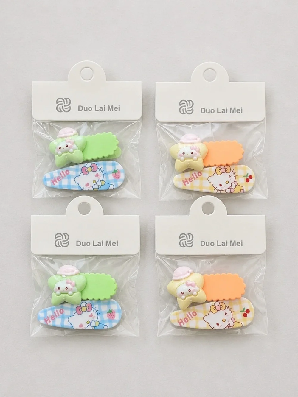 NWT Set of 4 Hello Kitty Child Size Hair Clips Barretts Green Orange Blue Yellow